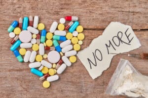 Painkillers with writing saying 'no more'